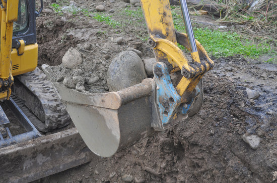 Excavator Digging A Hole