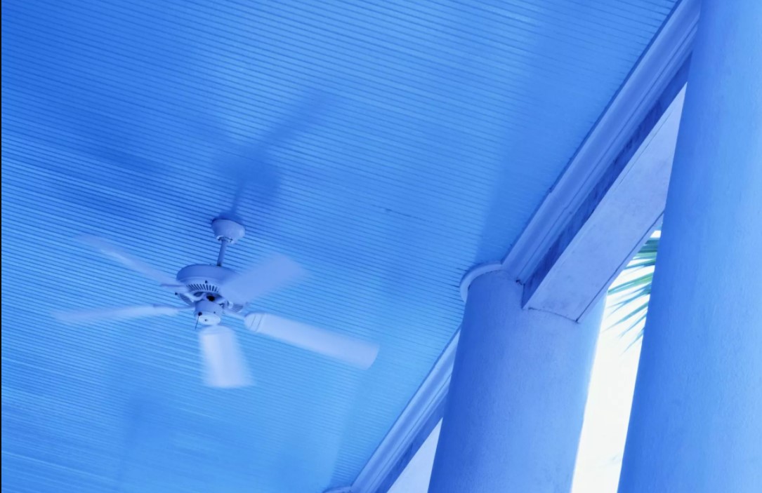 Completely Blue Ceiling With Fan