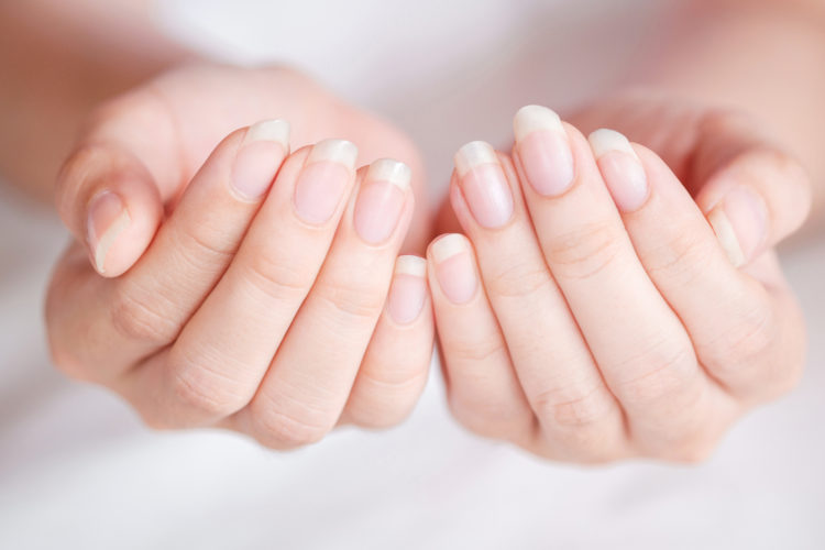 Close Up Long Fingernail Of Women On Background Blurred, Concept Of Health Care Of The Fingernail.